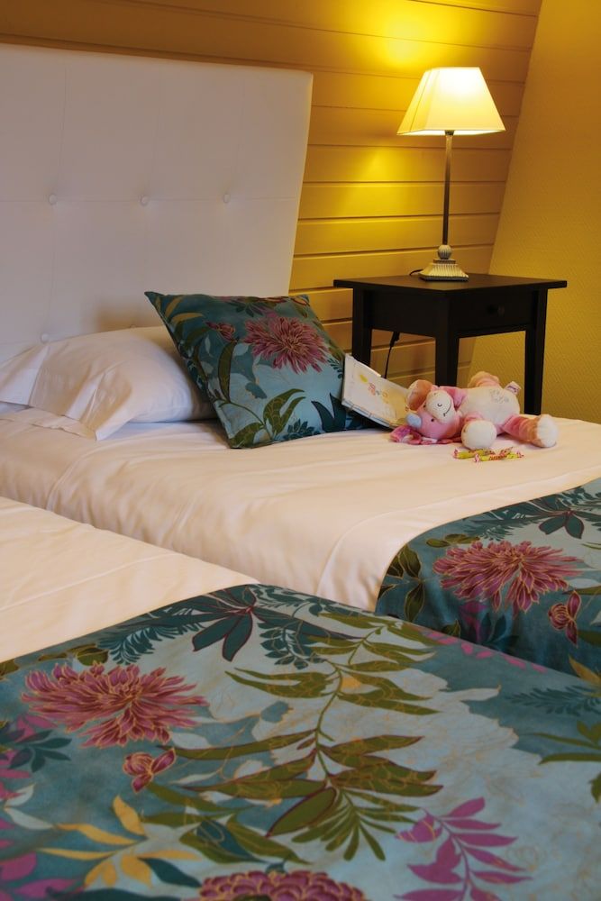 Le Gouverneur Quadruple Room