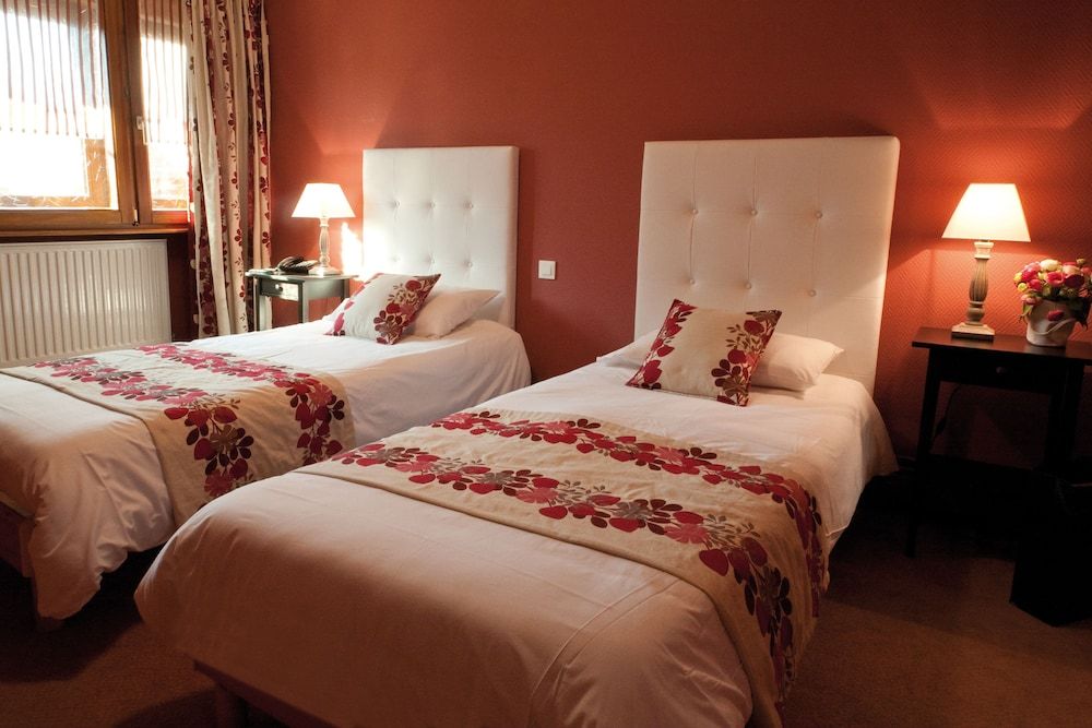 Le Gouverneur Quadruple Room 4