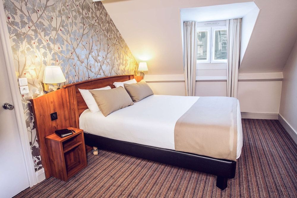 undefined Timhotel Le Louvre