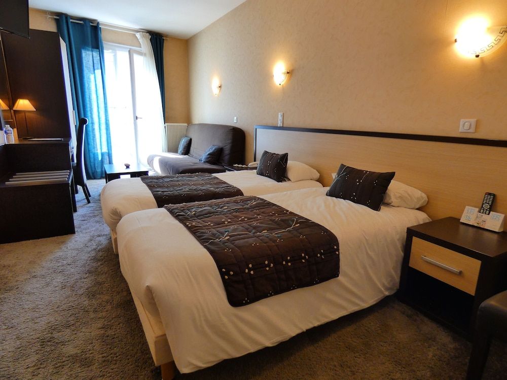 Hôtel Emeraude Quadruple Room