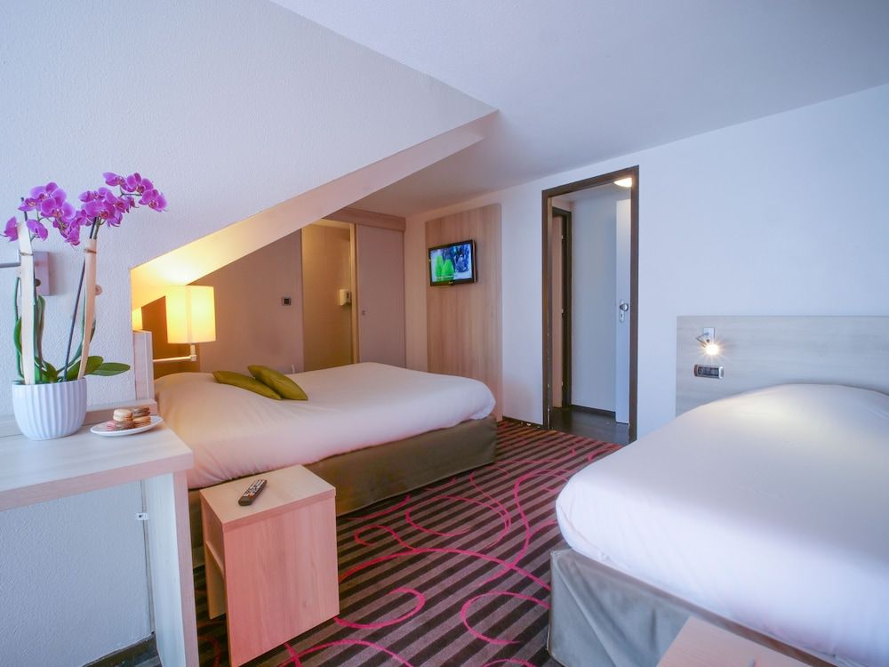 Triple Room (1 grand lit + 1 lit d’une personne)