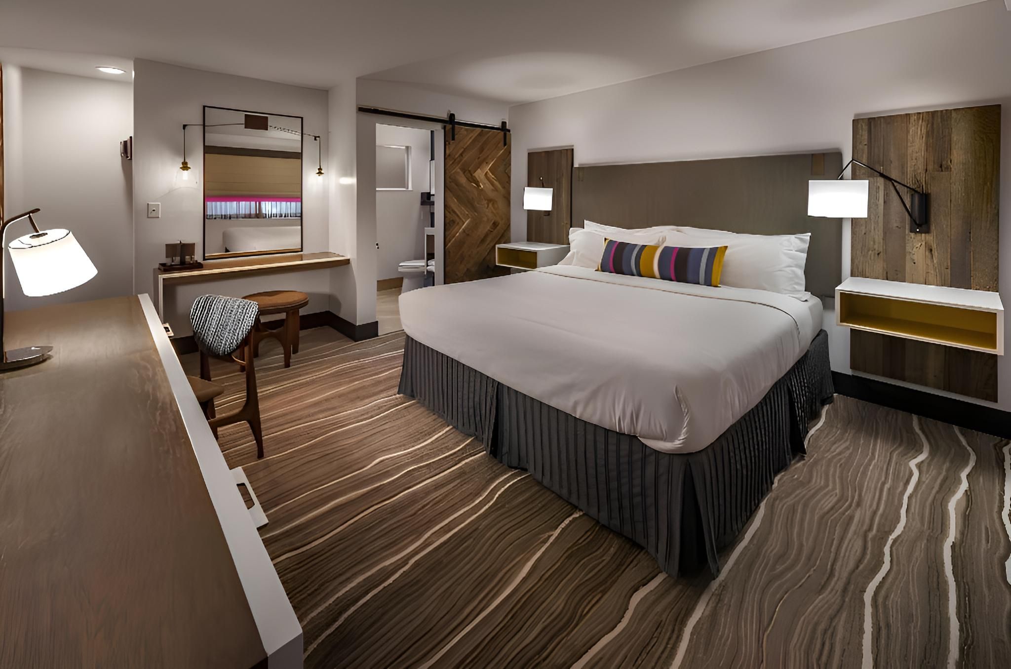 1 King Bed. Non-Smoking. Pet Friendly Room. Mini Fridge. Wi-Fi.