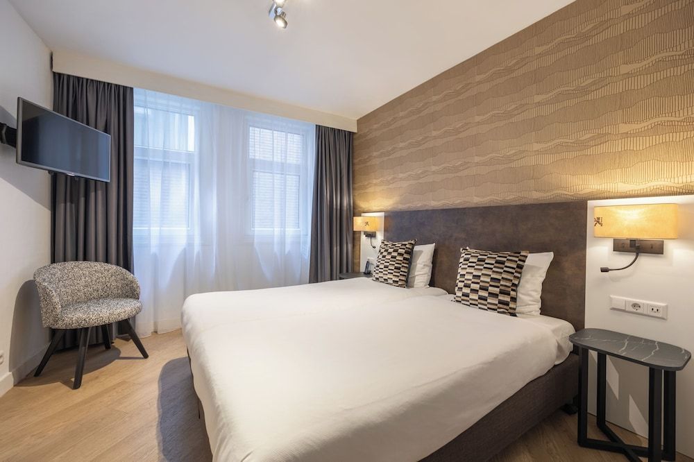 Hotel Amsterdam De Roode Leeuw Comfort Room, City View