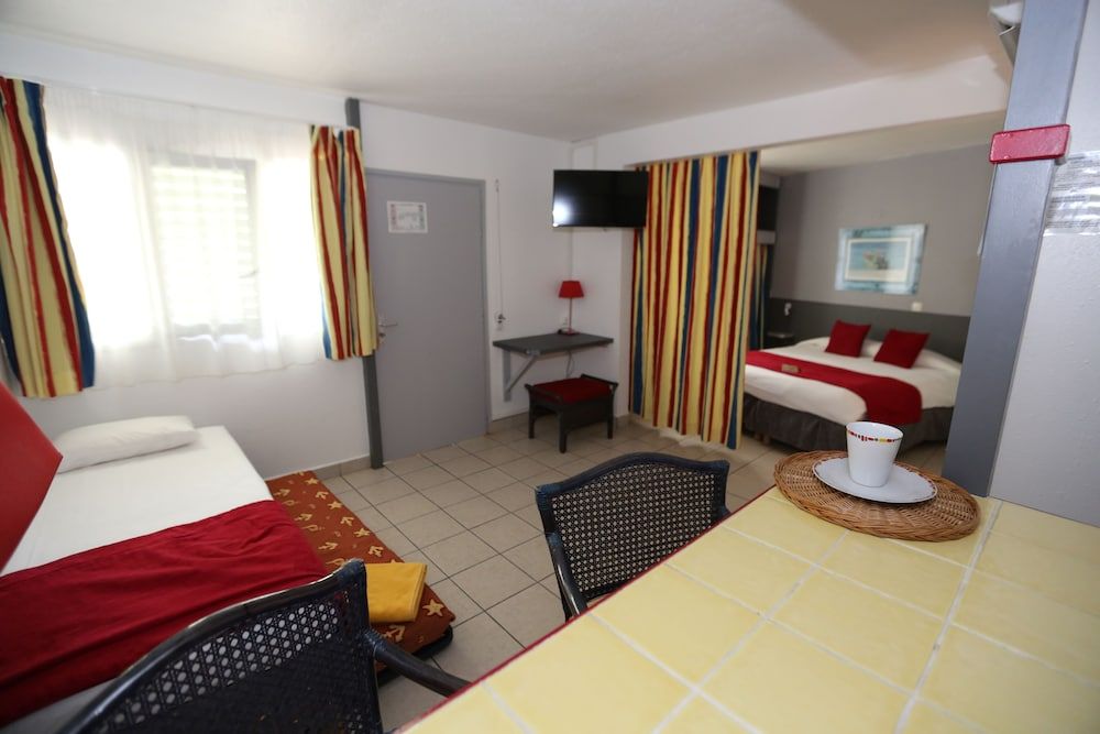 Hôtel La Maison Créole Quadruple Room, Kitchenette 4