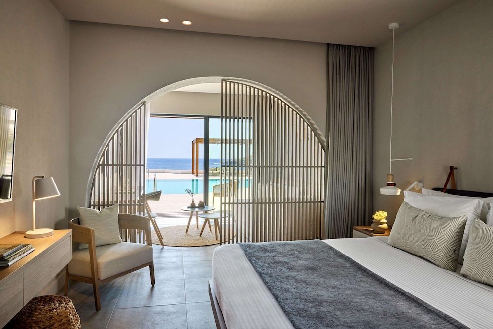Open Plan Suite with Sea View & Sharing Pool