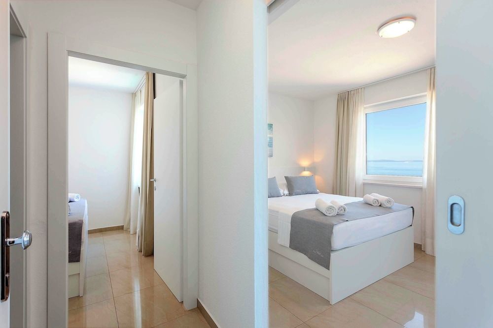 Sunset Split Rooms Quadruple Room, Balcony, Sea View 7
