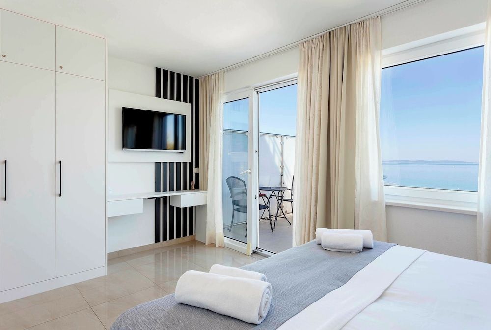 Sunset Split Rooms Quadruple Room, Balcony, Sea View 9