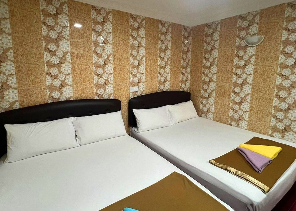 New Wave Hotel Melawati Quadruple Room 2