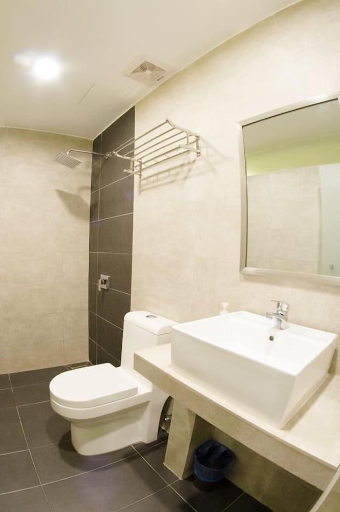 Deluxe Quadruple Room, 2 Queen Beds, City View