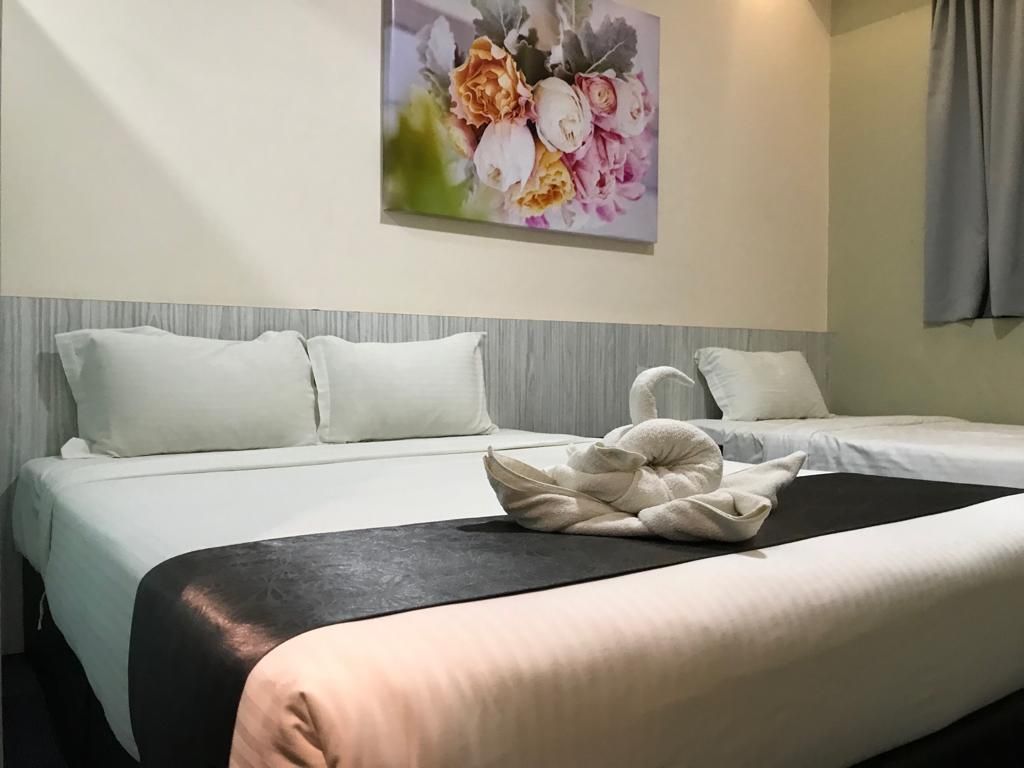 kimal hotel kamunting Deluxe Triple Room 5