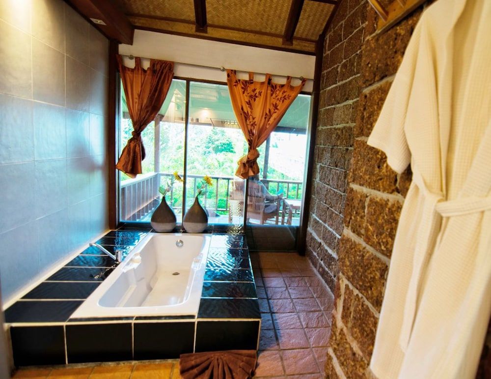 Faye Orchid Resort Classic Family Villa with Bath Tub 8