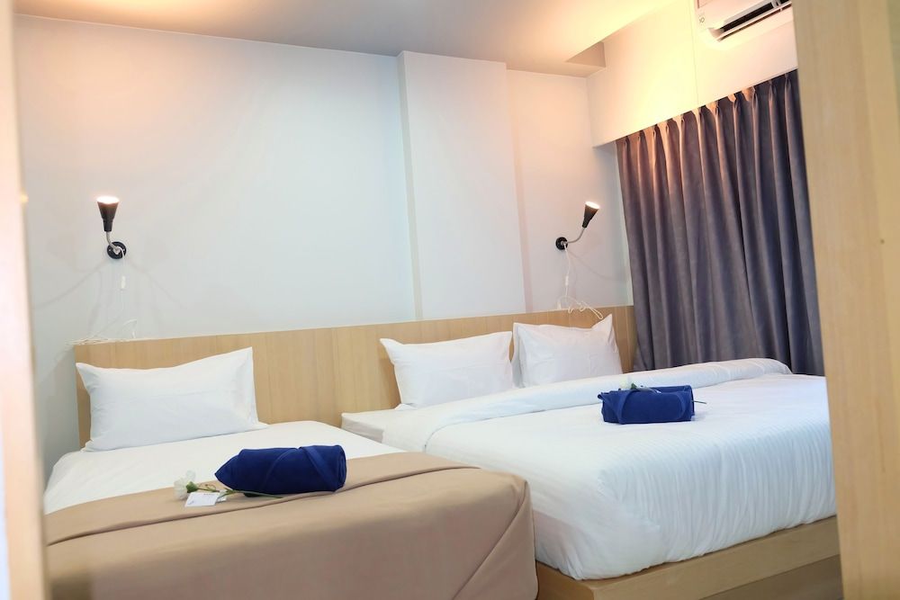 Bangkok Boutique Resort Rangsit Deluxe Triple Room 7