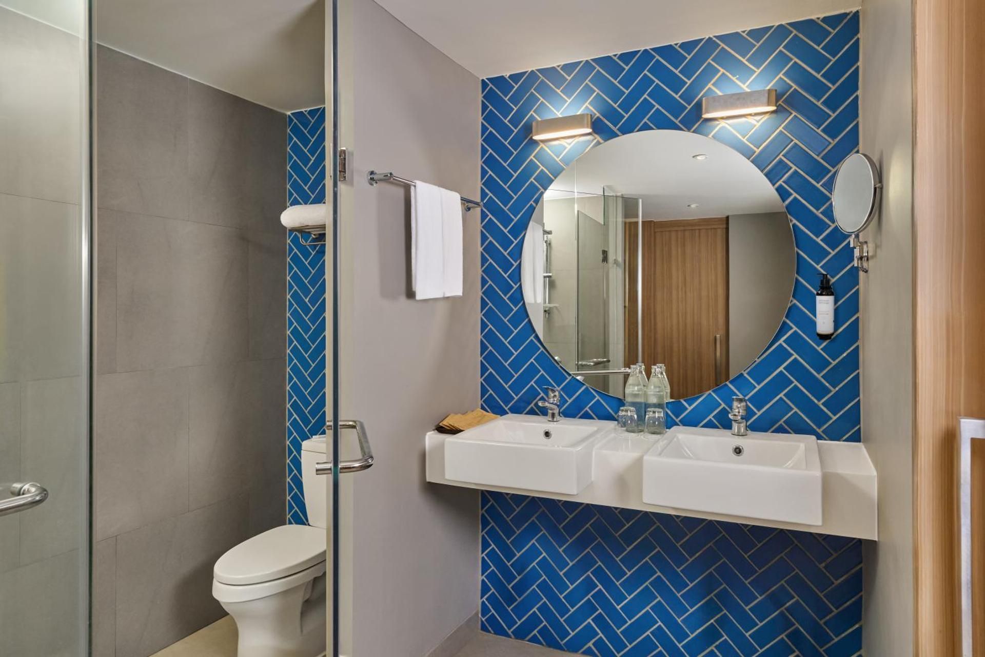 Two-Bedroom Suite with One Double and Two Single Beds