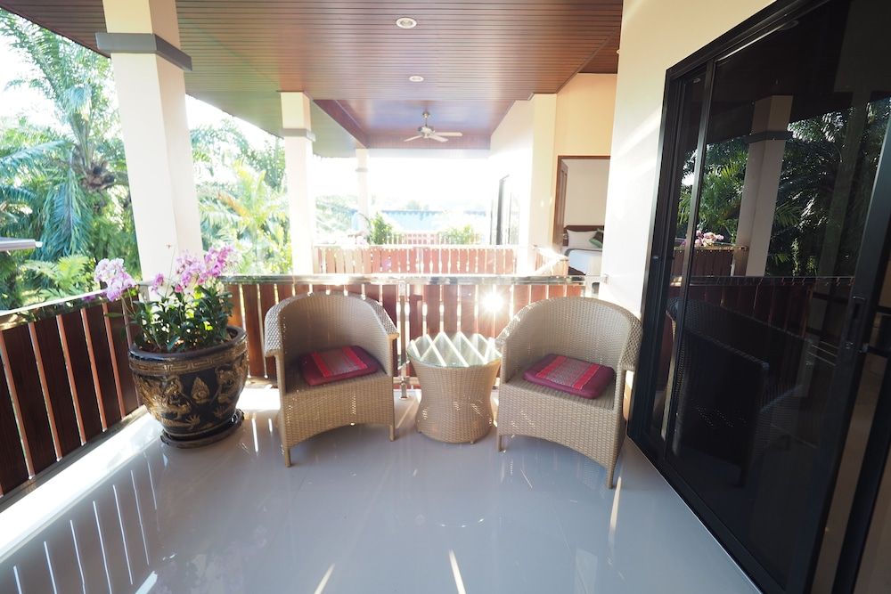 Chanapha Residence Standard Room, Balcony, Garden View 9