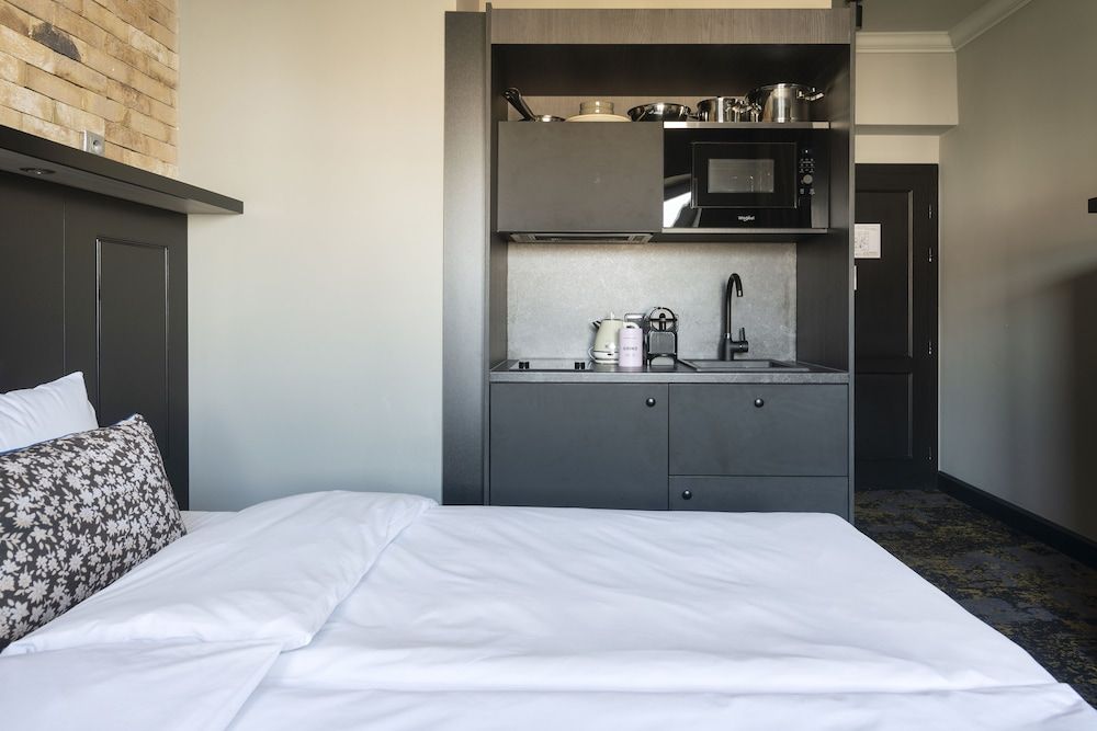 Numa Prague Root M Studio, Kitchenette and Bathtub 2