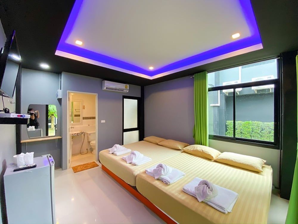 Natthapon Resort Deluxe Quadruple Room 3