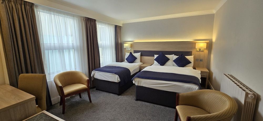 The Empress Hotel Family Triple Room 4