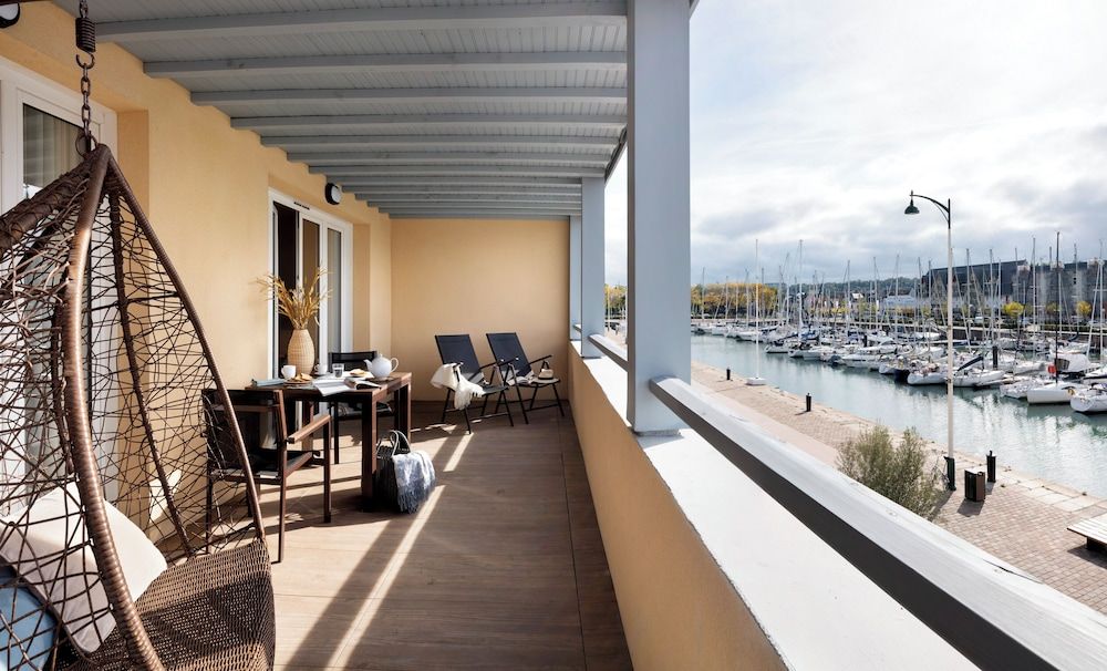 Apartment 4 people - 1 bedroom - Terrace - Port view - Harbor buildings