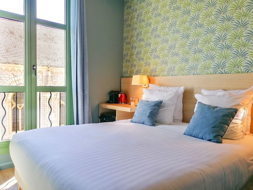 Hotel Du Centre, un hotel AMMI Chambre Petite Double Economique 9m² - Vue Cour 4