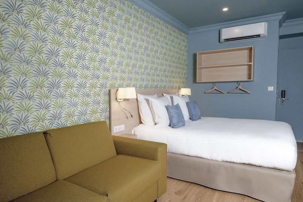 Hotel Du Centre, un hotel AMMI Suite Junior 20m² - Vue Notre-Dame 4