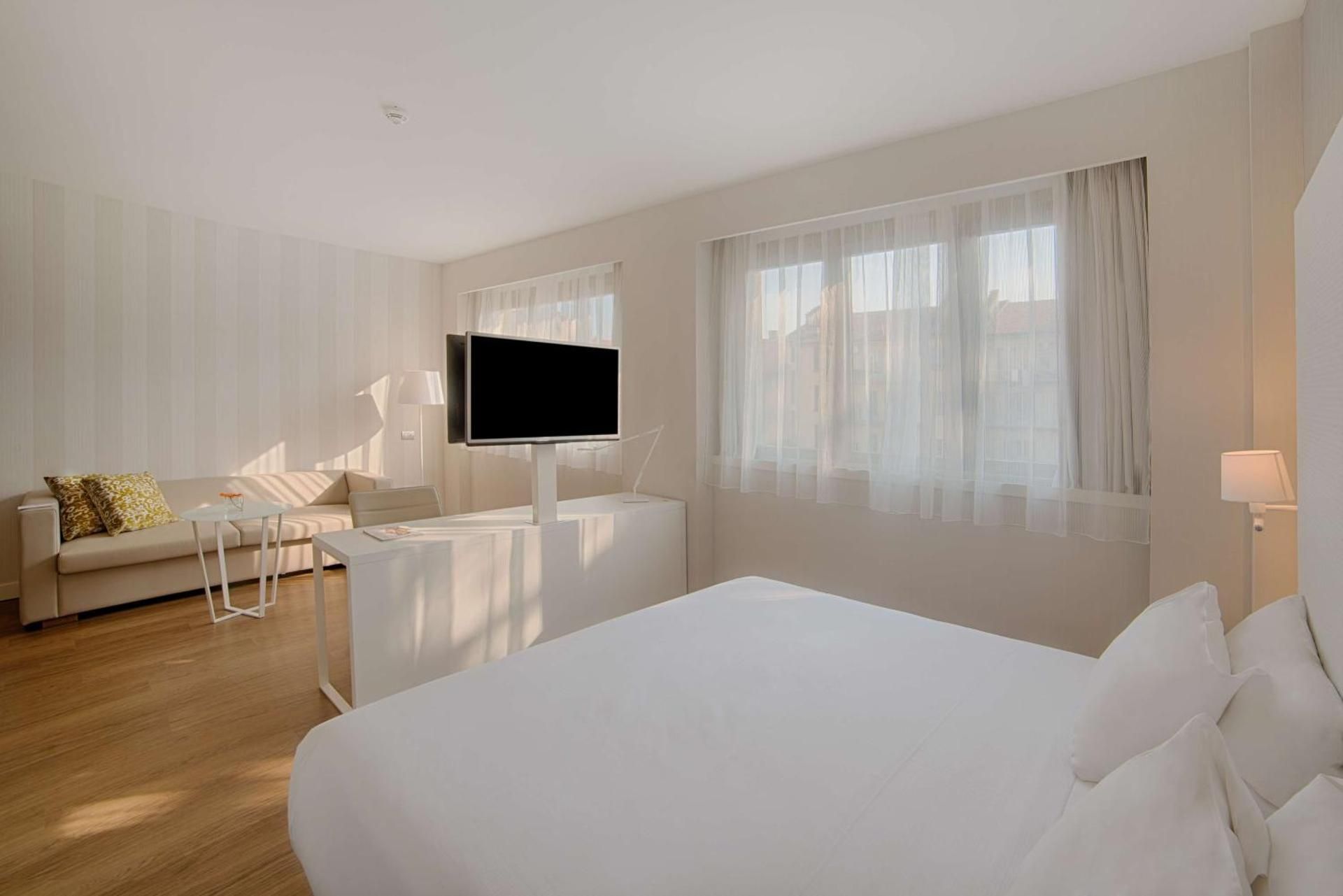 NH Torino Centro Junior Suite with extra bed (2 adults + 2 children)