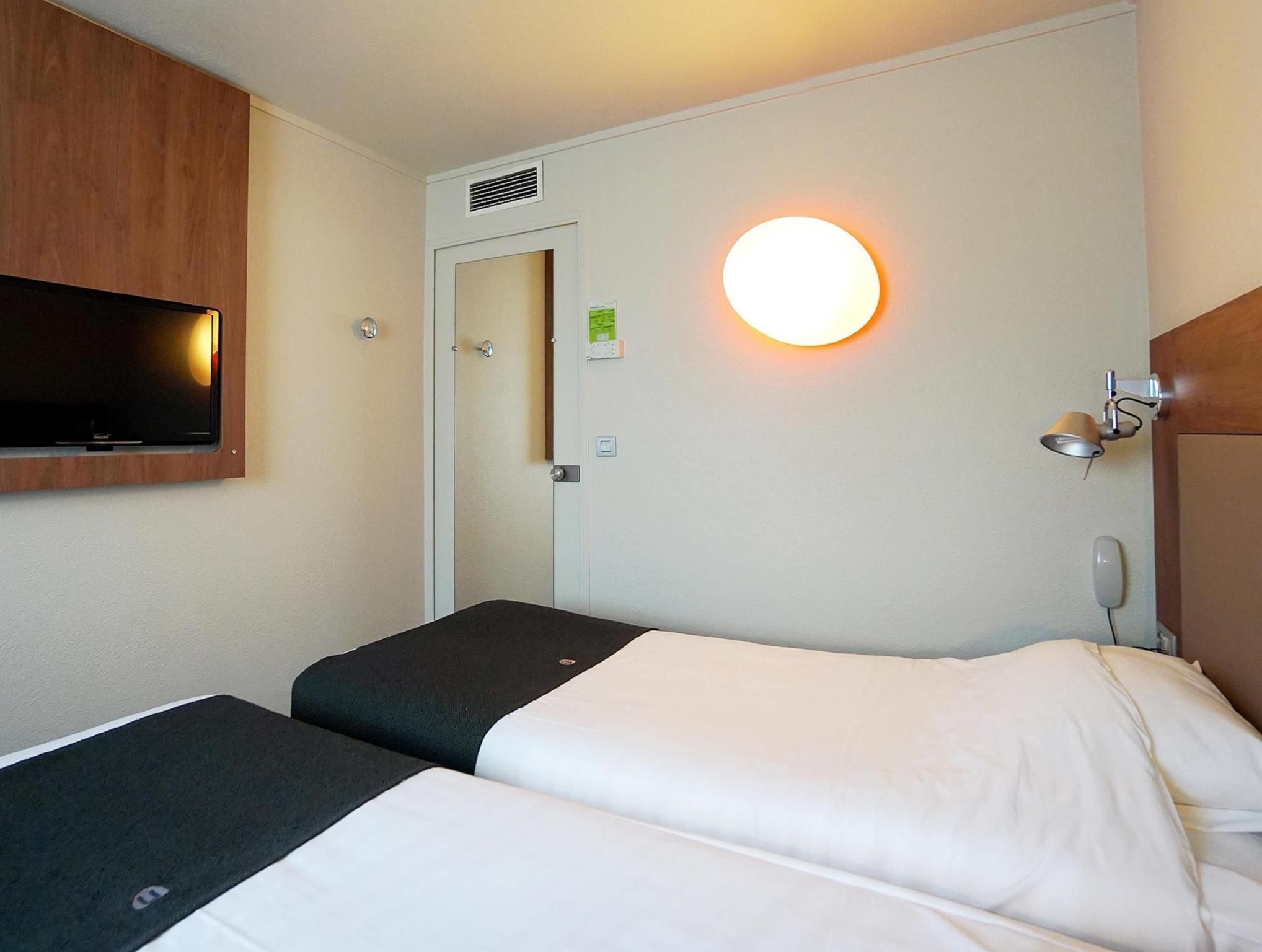 Next Generation Quadruple Room with 4 Single Beds