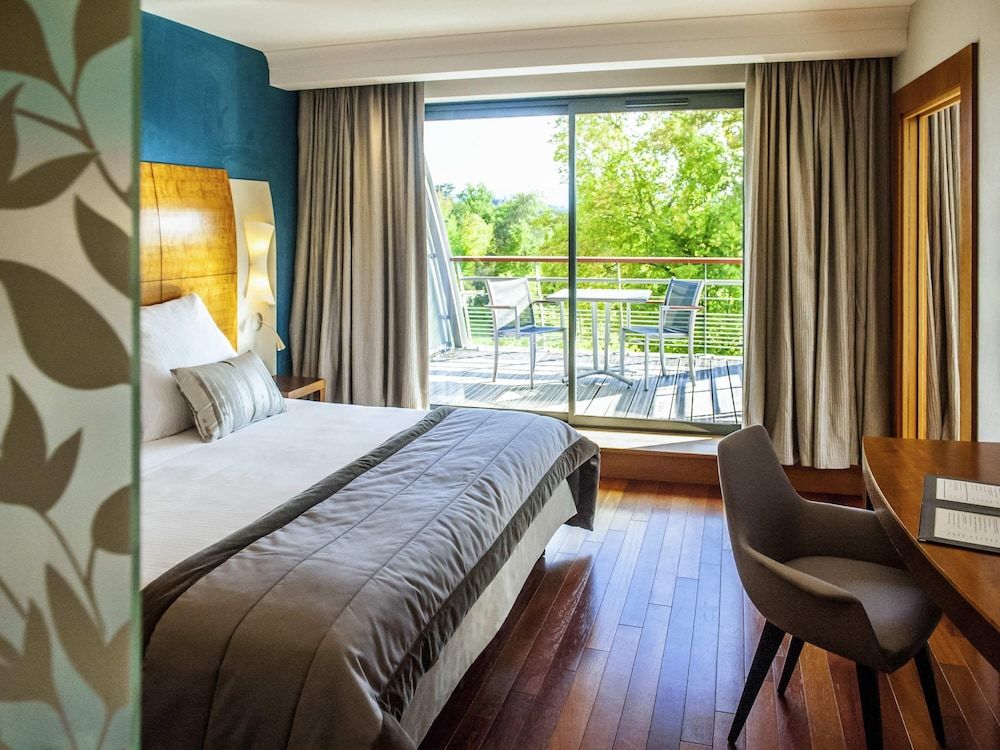 Deluxe Suite, 1 King Bed, Terrace (Grounds view)