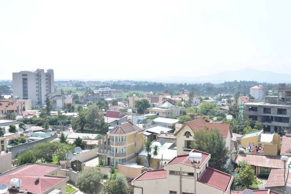 Impress Hotel Family Room, 2 Bedrooms, Kitchenette, City View 5