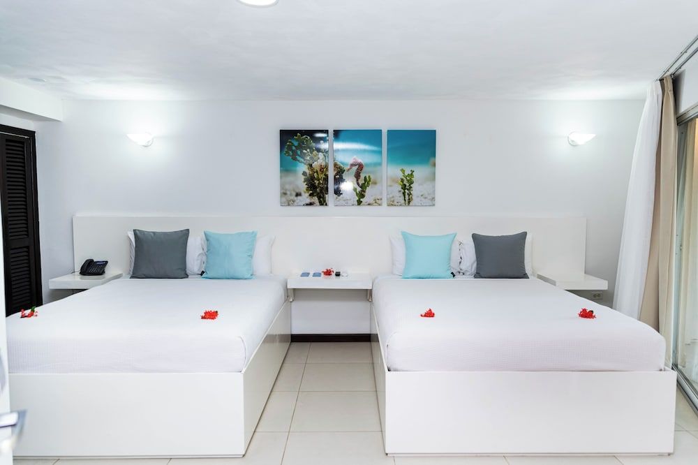 Paradise Beach Hotel & Resort Two Queen Beds Paradise Balcony Room 8