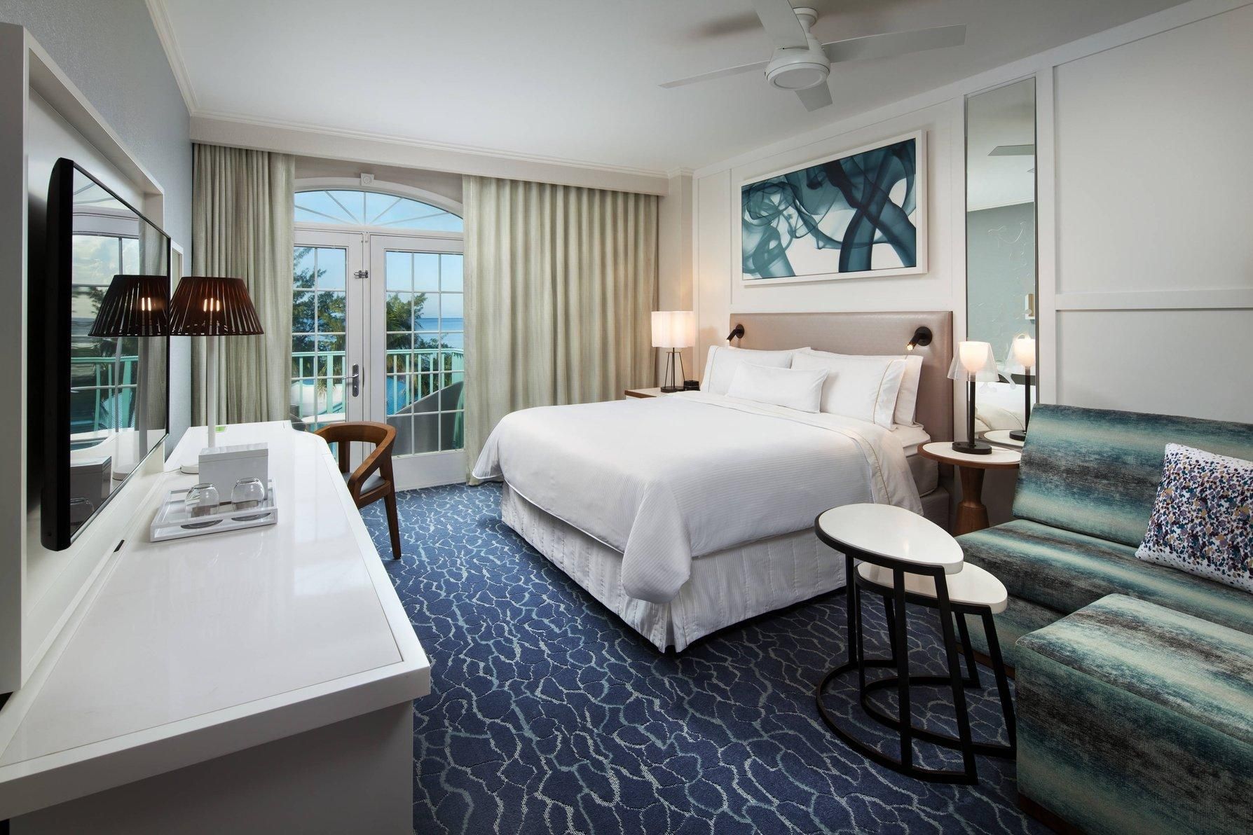 1 Bedroom Suite, 1 King, Sofa bed, Partial ocean view