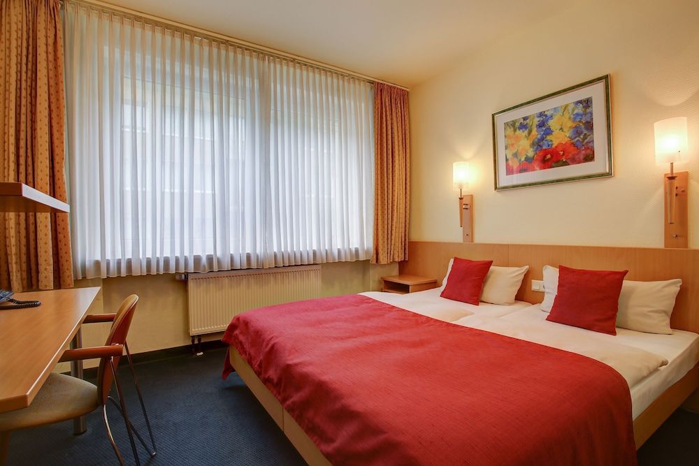 Trip Inn Hotel Conti Double or Twin Room 9