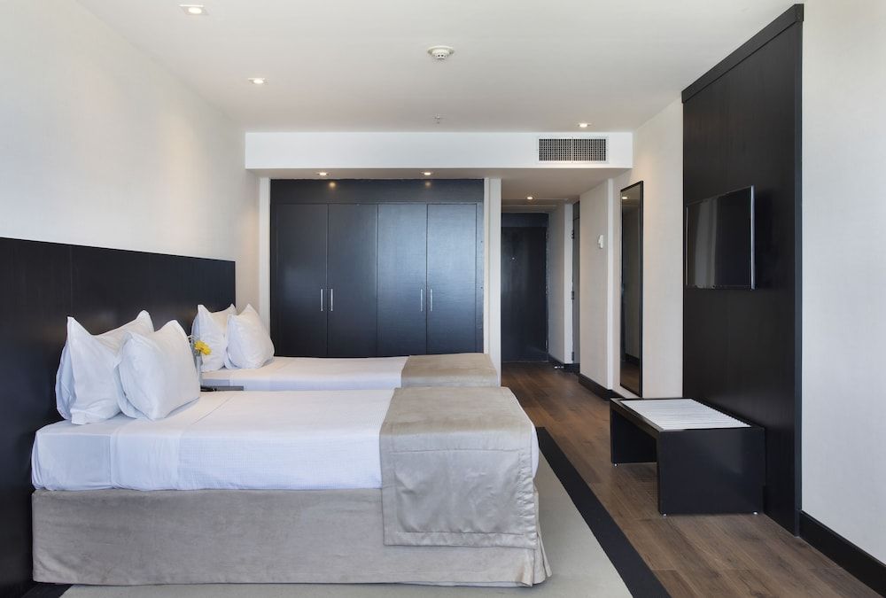 Luxo, 1 Twin, Beach View