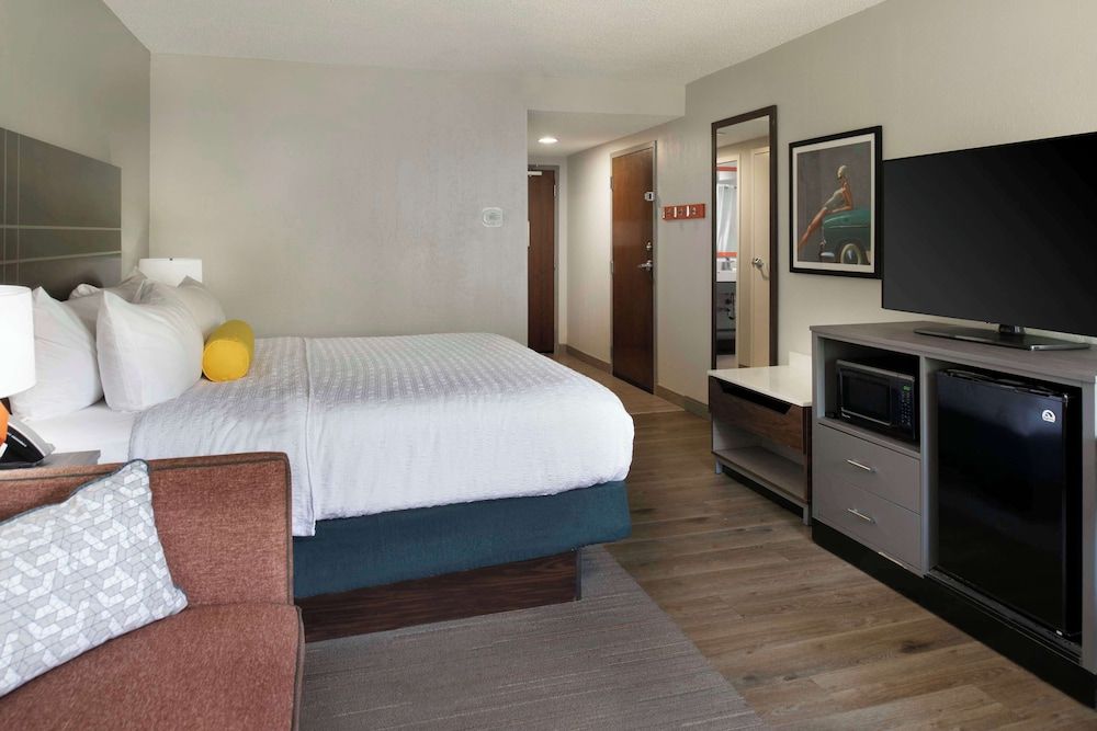Room, 1 King Bed with Sofa bed, Refrigerator & Microwave