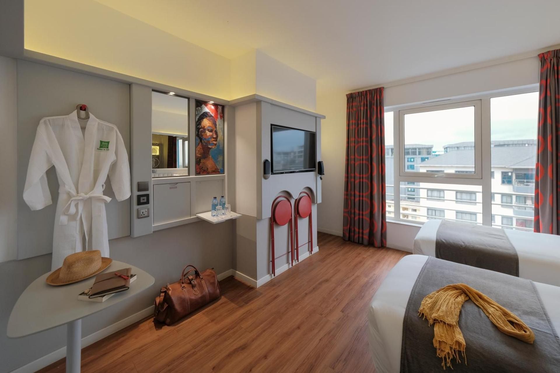 Trendy room with two single beds