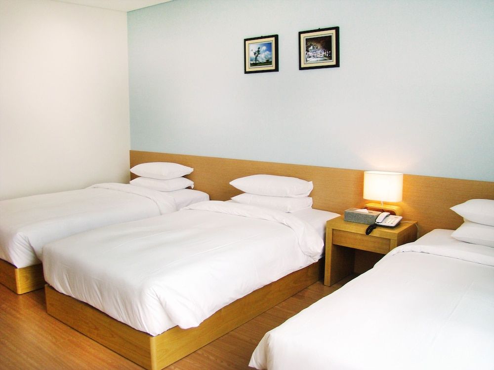 You Us Hotel Deluxe Family Triple Room