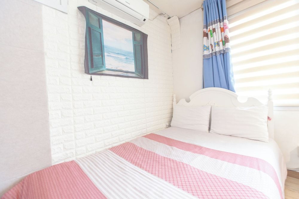 Hongdae Style Guesthouse Panoramic Triple Room, 1 Bedroom, Shared Bathroom, Garden View [Must notify check-in time to Hotel] 5