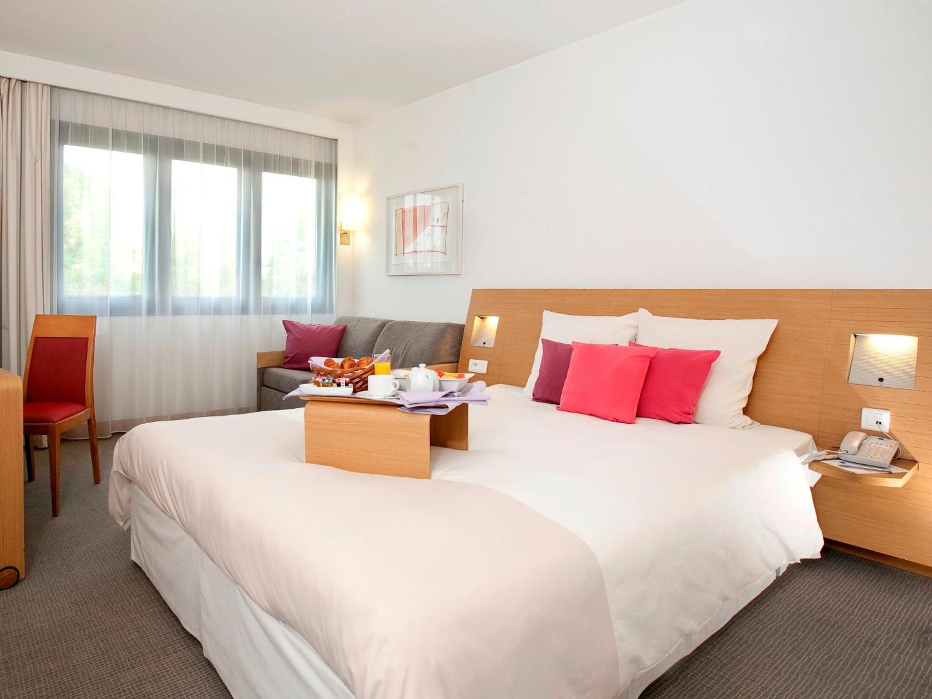 VIP rooms with 1 queen-sized bed and a sofa