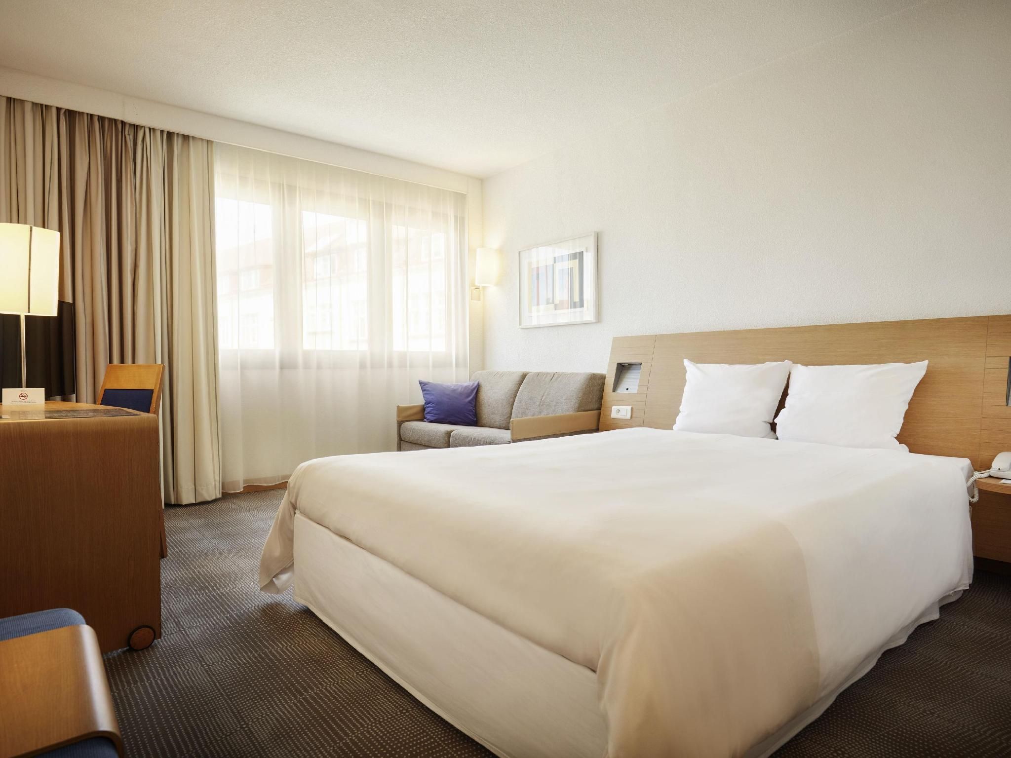 VIP rooms with 1 queen-sized bed and a sofa