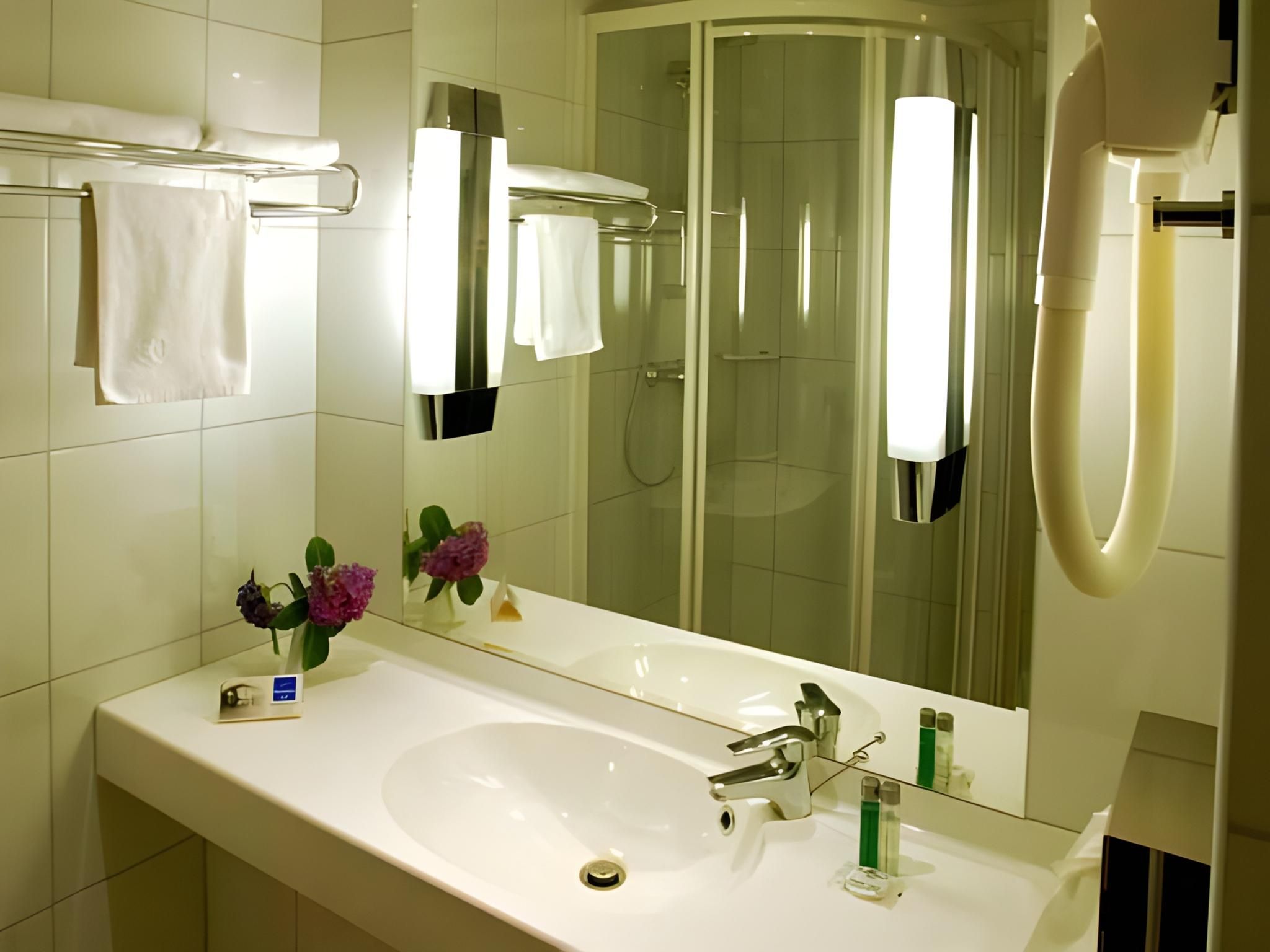 VIP rooms with 1 queen-sized bed and a sofa