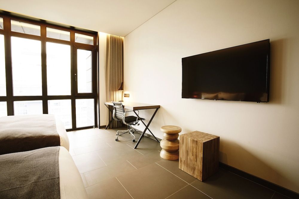 MD HOTEL DONGTAN Family Twin Room with Bathtub 8