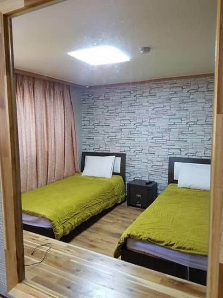 Green and Blue Hotel Twin Room (1)