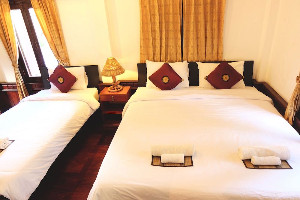 Phousi Guesthouse Family Room, Multiple Beds 3