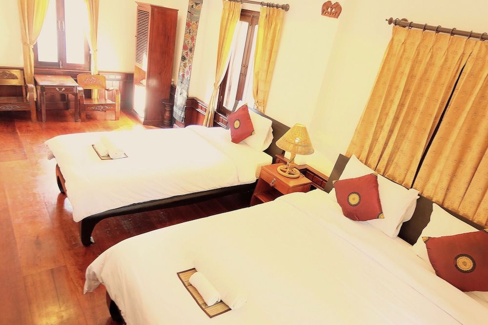 Phousi Guesthouse Family Room, Multiple Beds 4