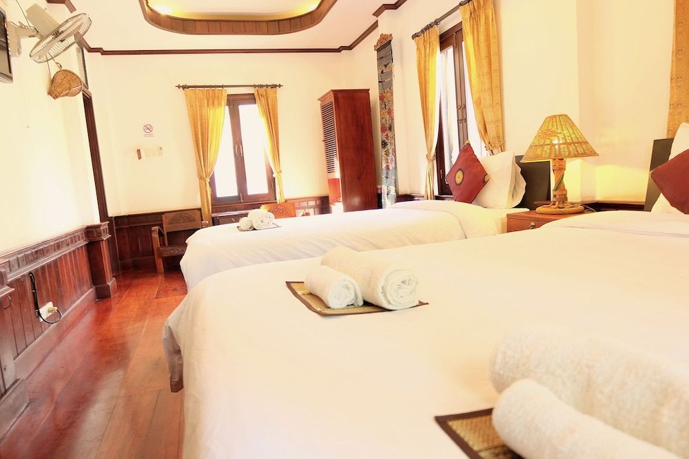 Phousi Guesthouse Family Room, Multiple Beds 2