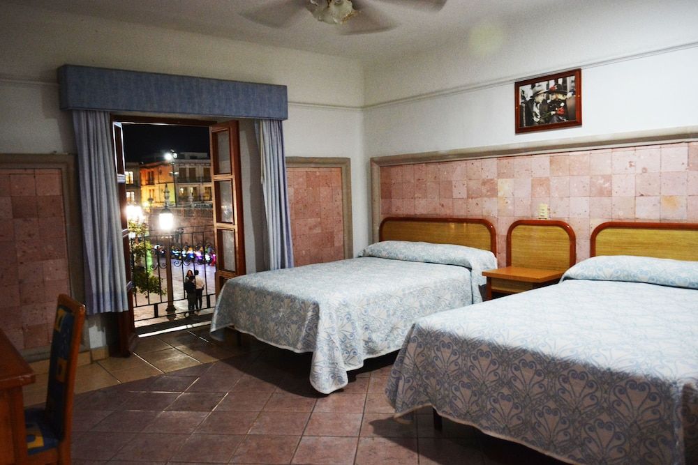 Room, Balcony (2 Double Beds and 1 Single Bed)