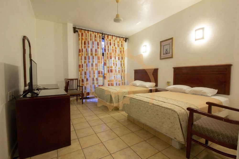 Caracol Plaza Standard Room, 2 Double Beds 4