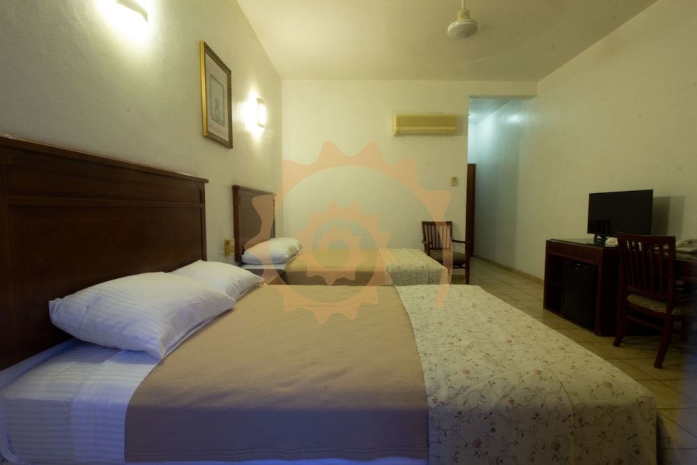 Caracol Plaza Standard Room, 2 Double Beds 3