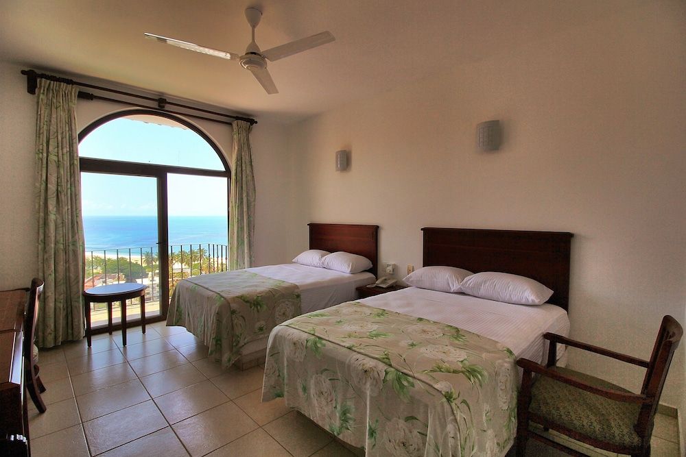 Caracol Plaza Standard Room, 2 Double Beds, Ocean View 3