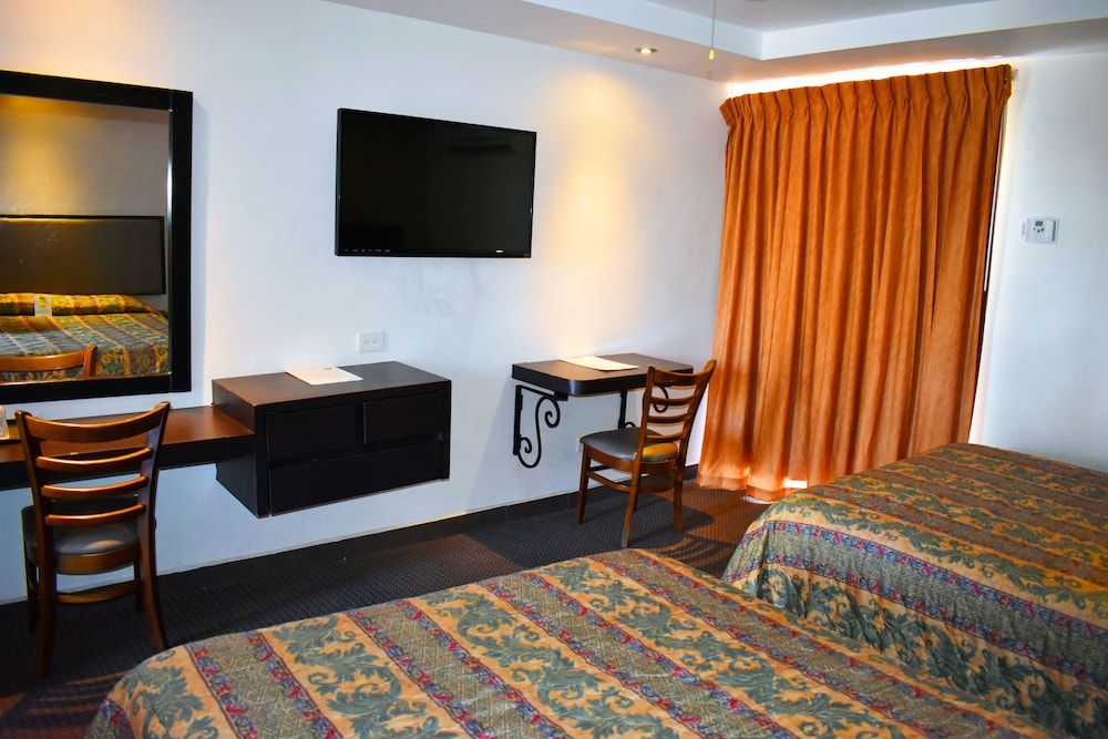 Hotel Siesta Real Habitacion estandar dos camas 4