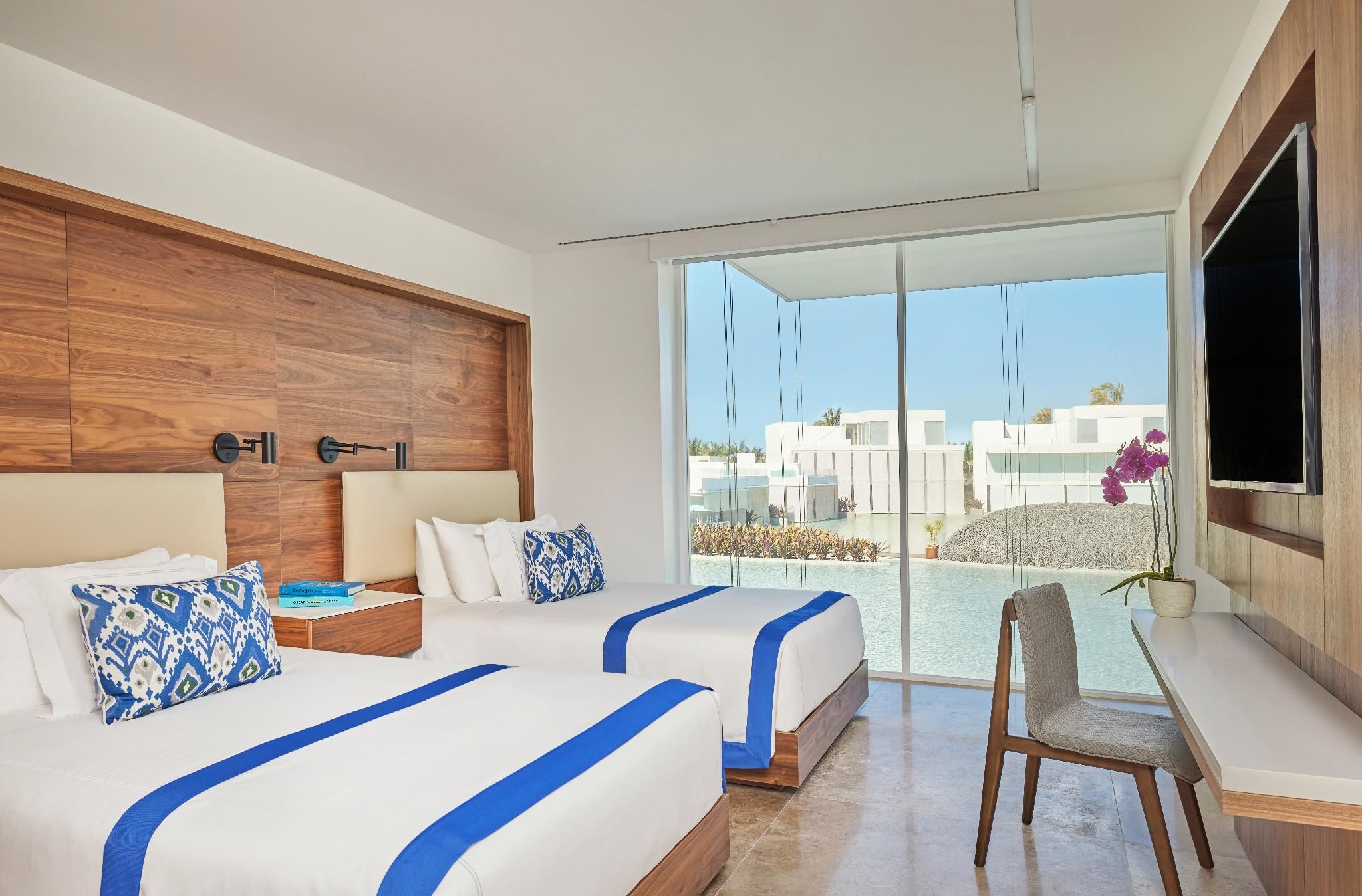 Two Bedroom Ocean Front Ground Level Suite, with Butler Service